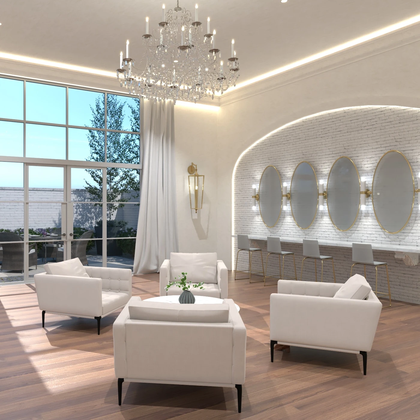 Elegant white wedding suite featuring hardwood floors, a crystal chandelier, plush white seating, large windows, and a beauty counter with four oval mirrors set against a white brick archway.