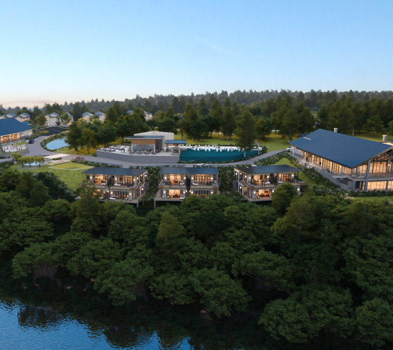 An aerial view rendering of a large, modern lakefront resort and wedding venue complex with blue roofs, multiple guest lodges, and a central pool area.