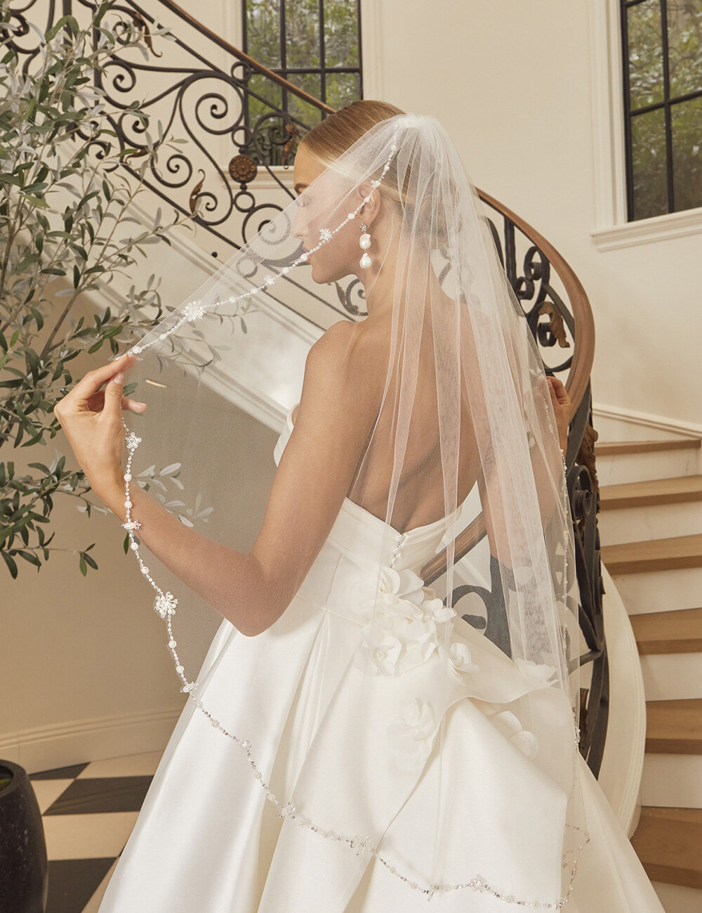 bride showing veil over face
