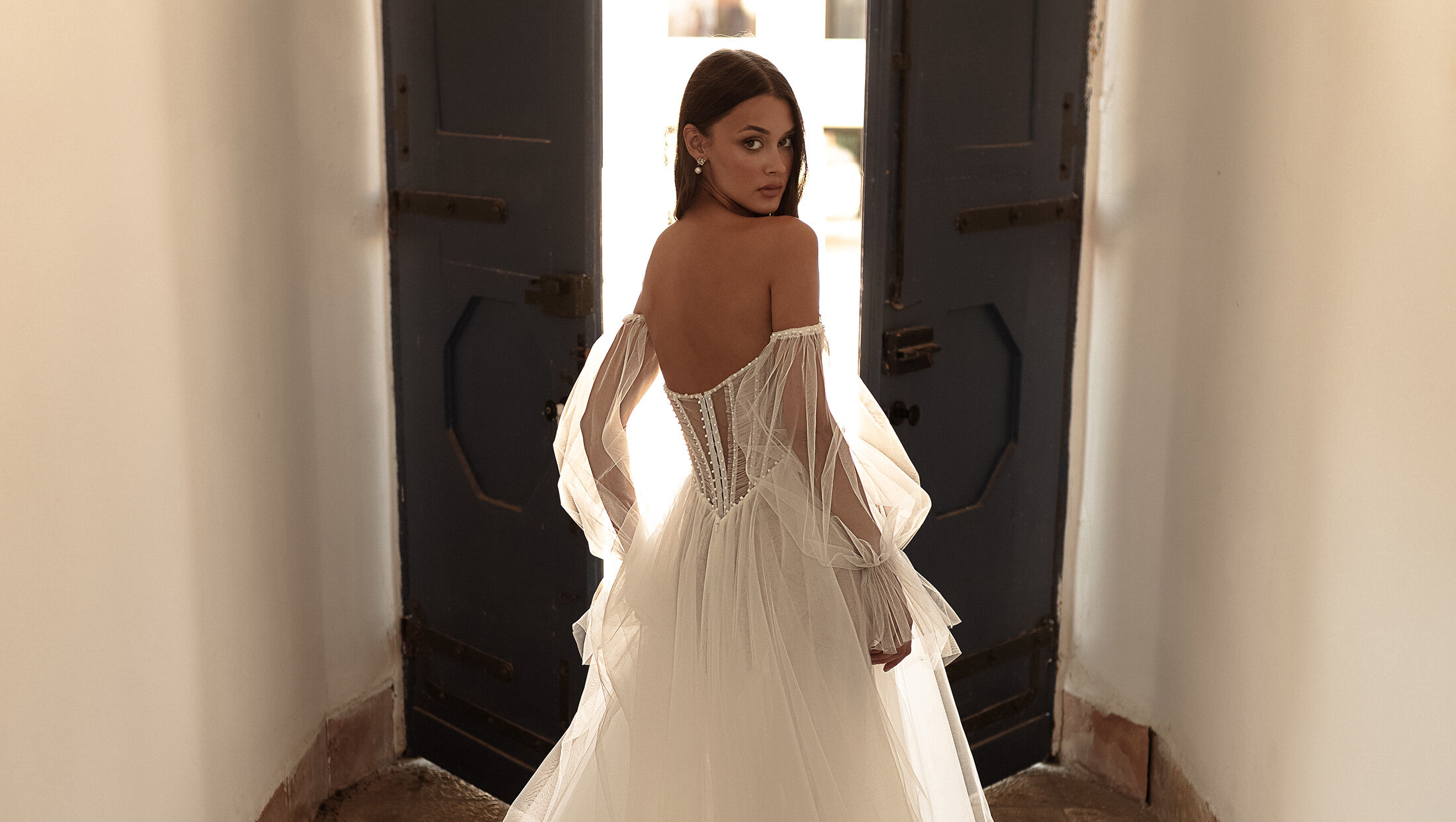 bride looking over shoulder smirking