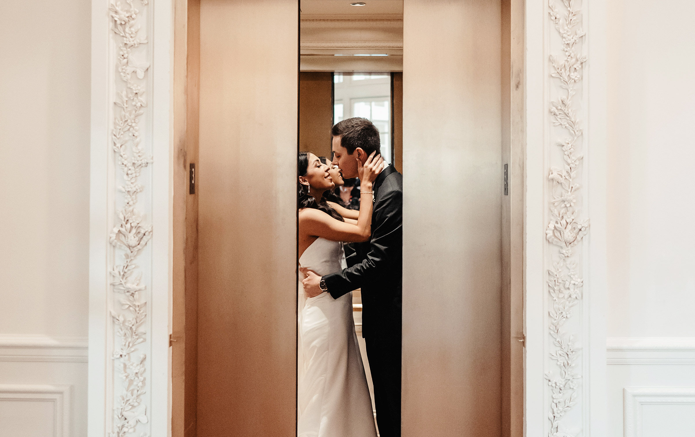 bride looking down in bridal gown