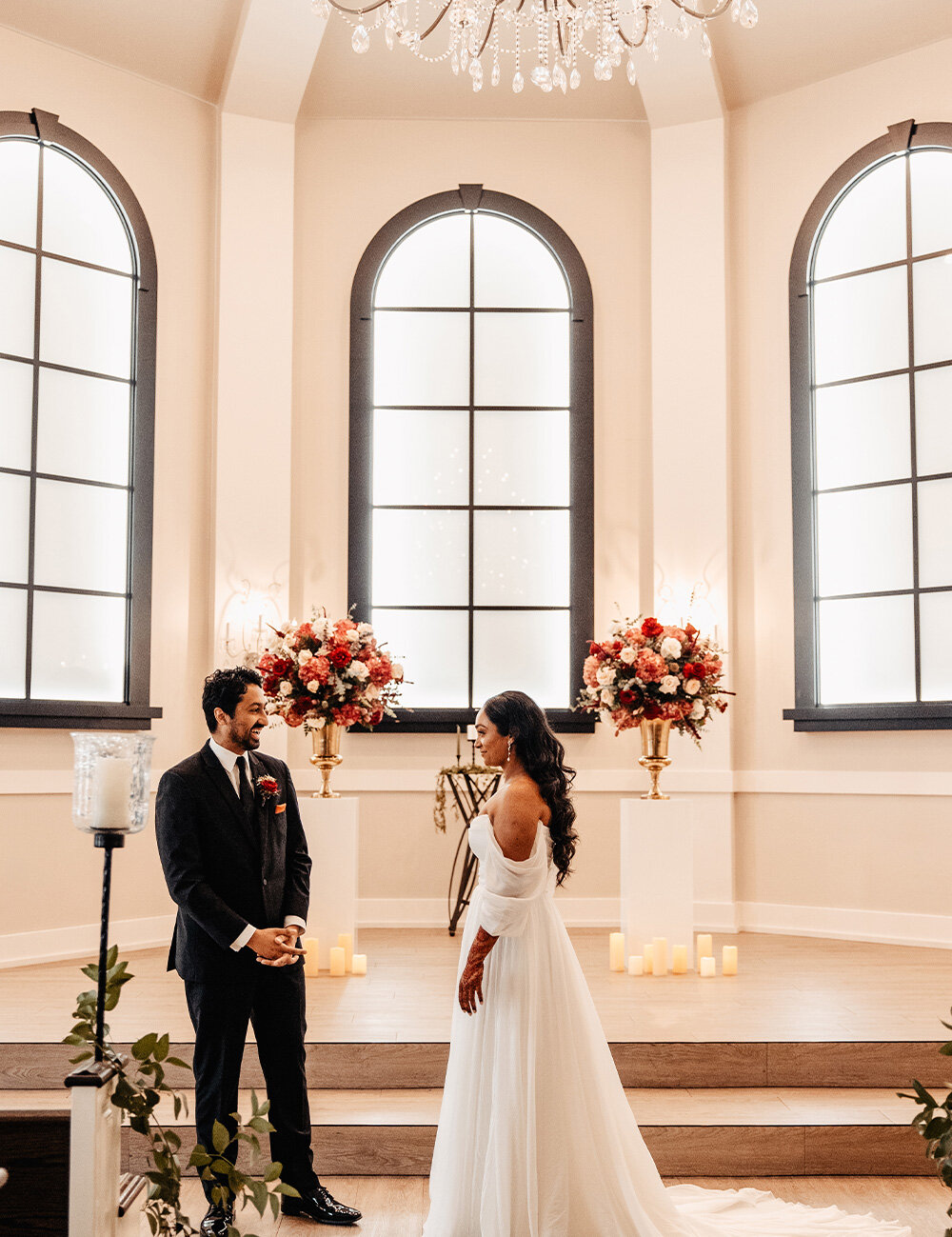 bride and groom standing near ceremony location