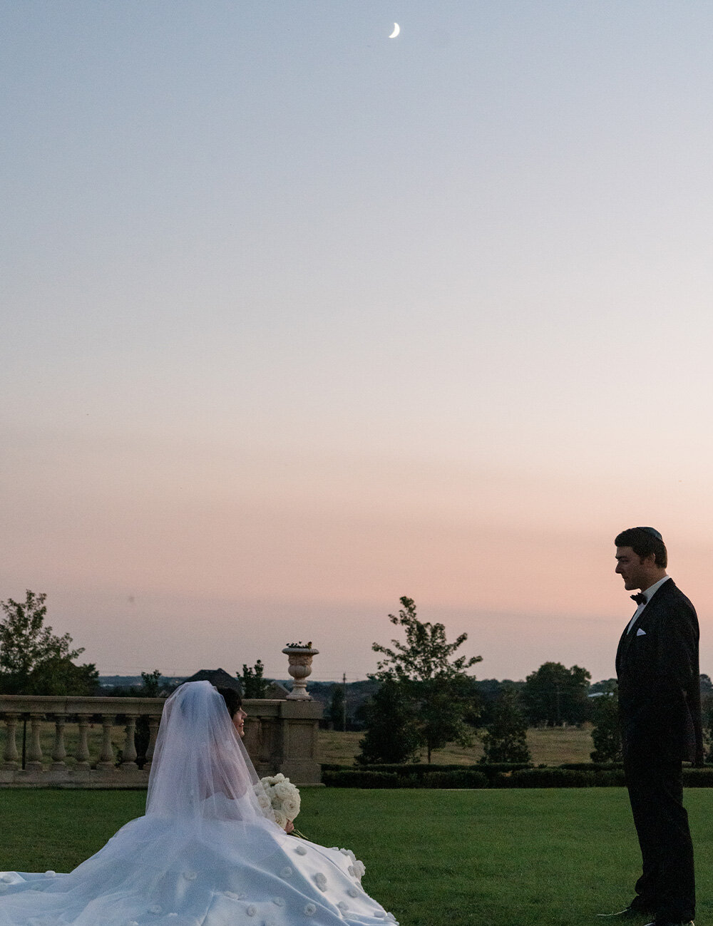 couple outside under moon