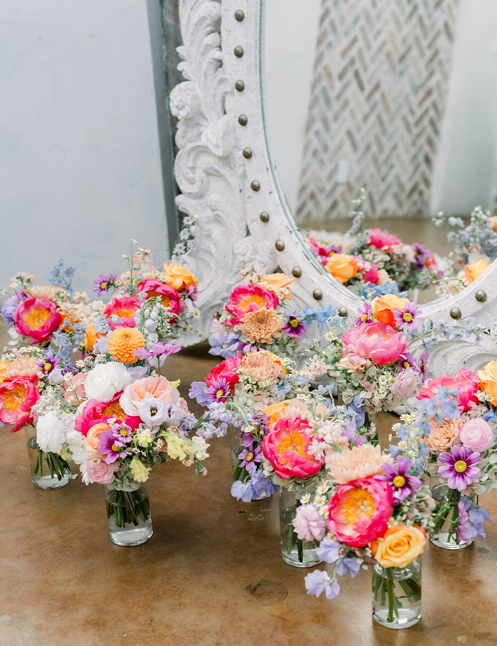 couple smiling at wedding table