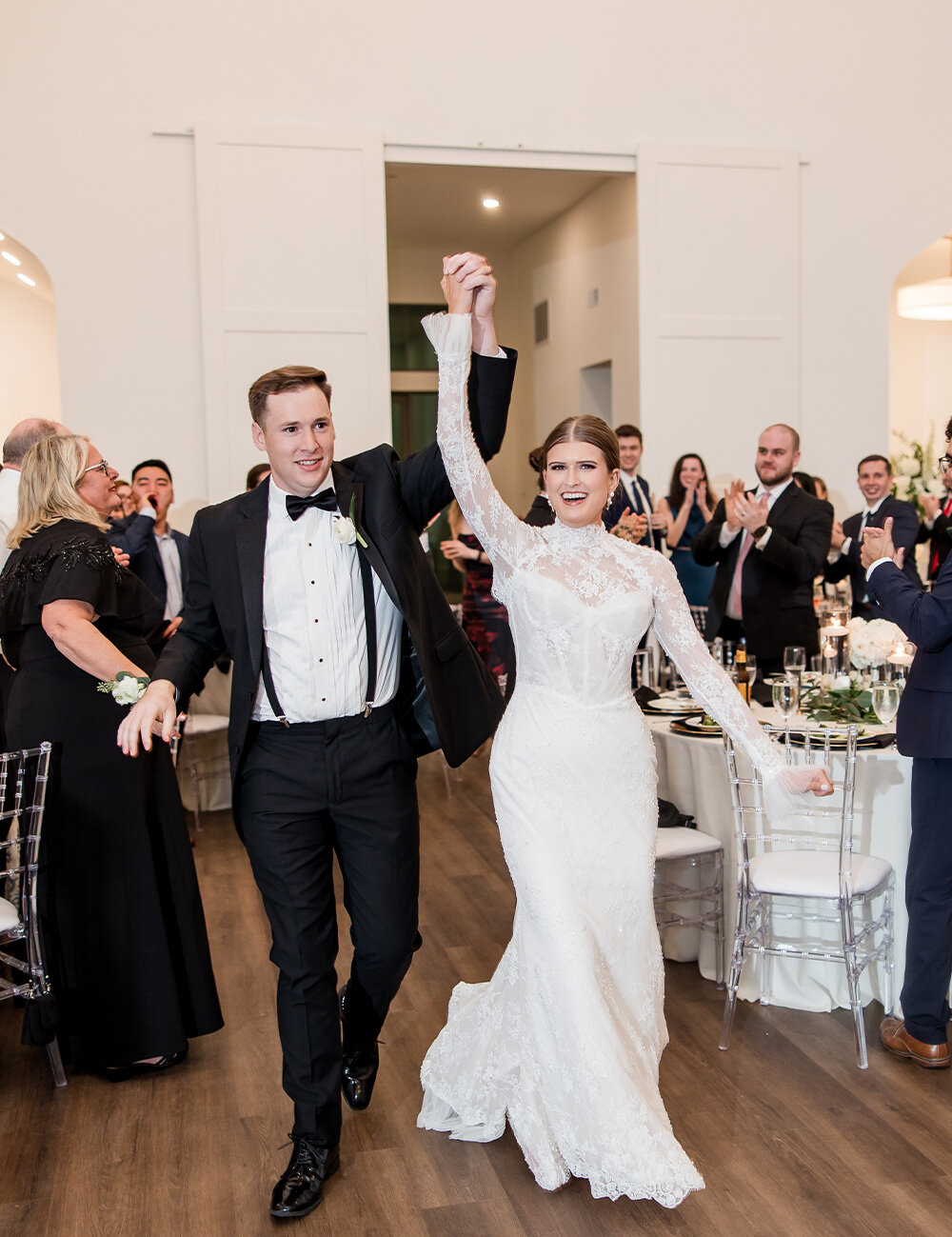couple smiling into reception space