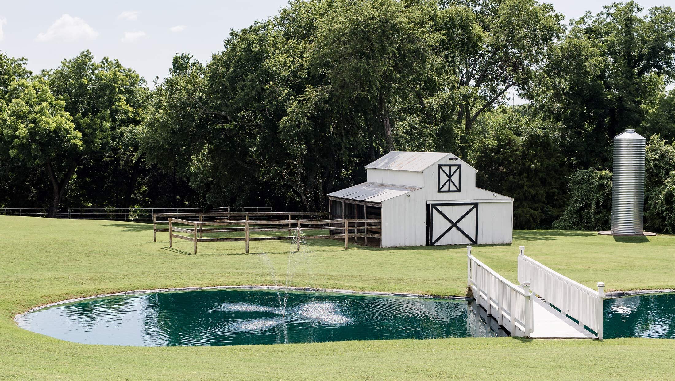 outside ceremony shot in front of mansion