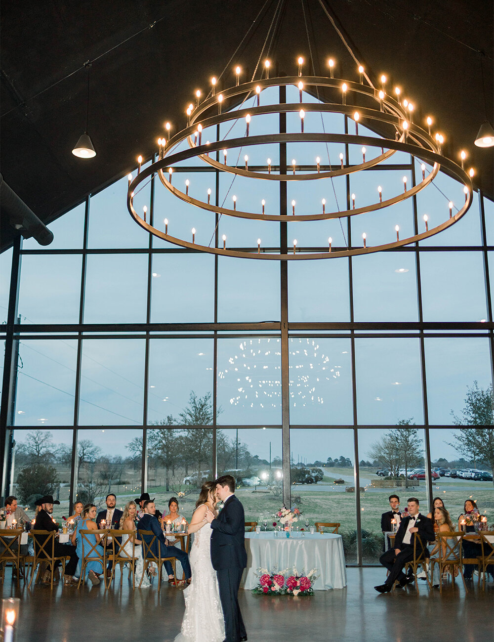 inside reception with couple dancing