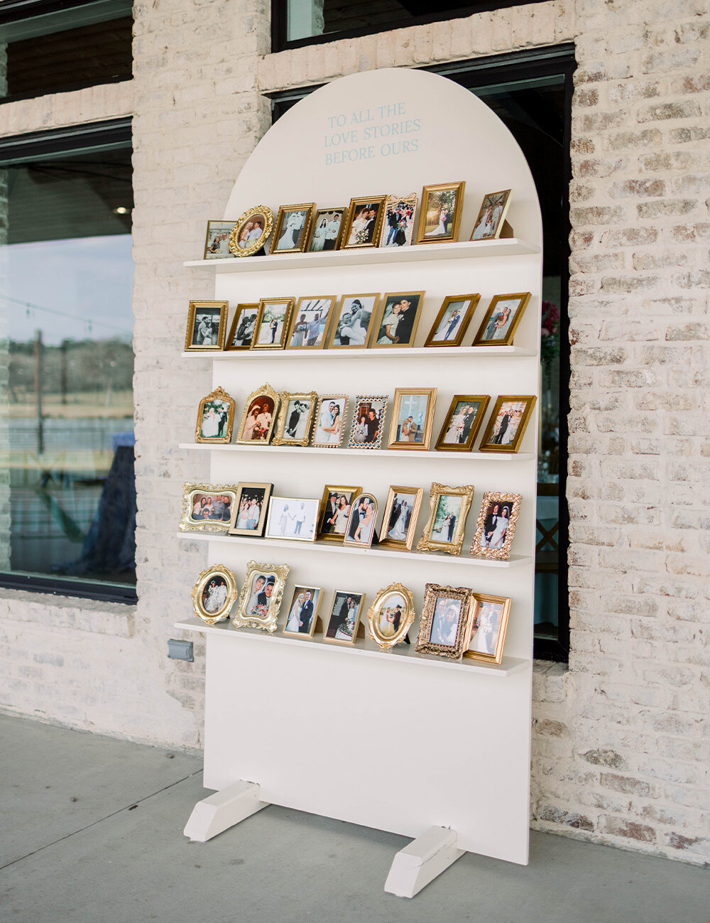 photo frames sitting on a shelf