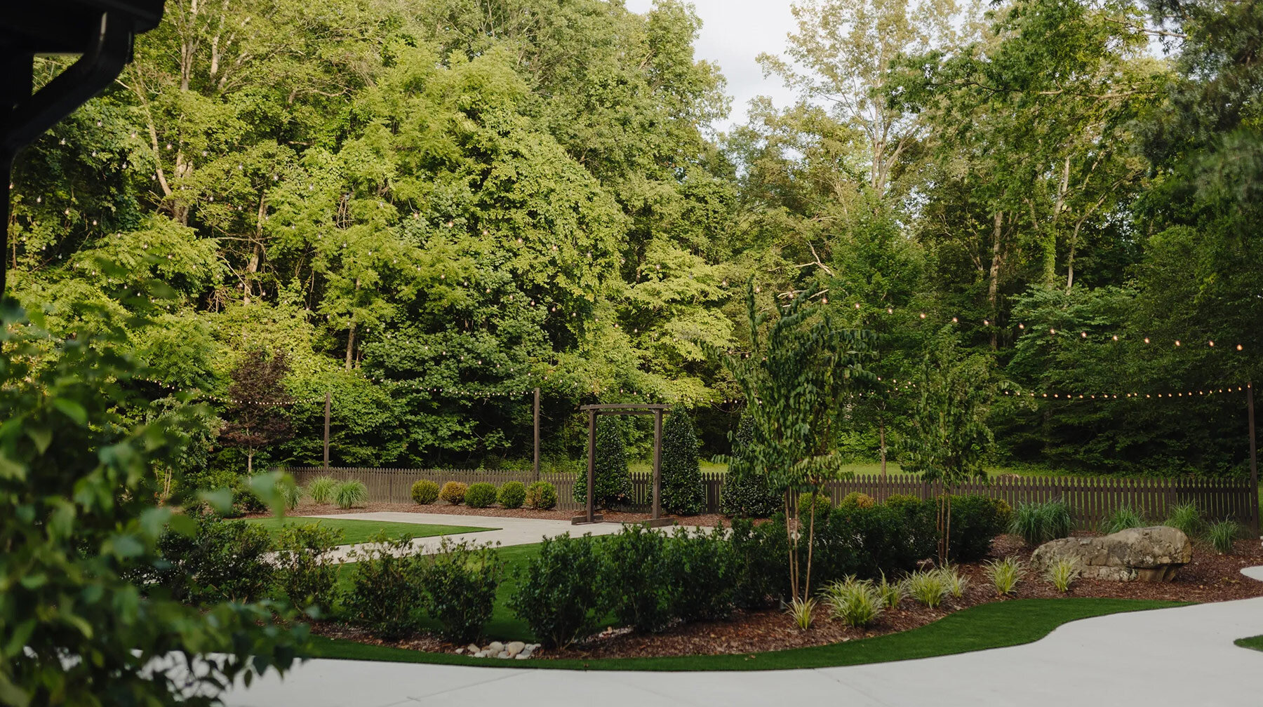 outdoor ceremony space surrounded by trees