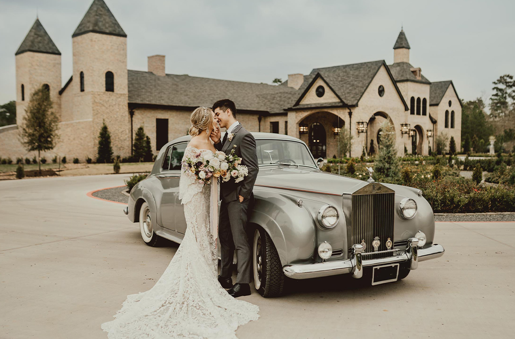 couple outside with silver car