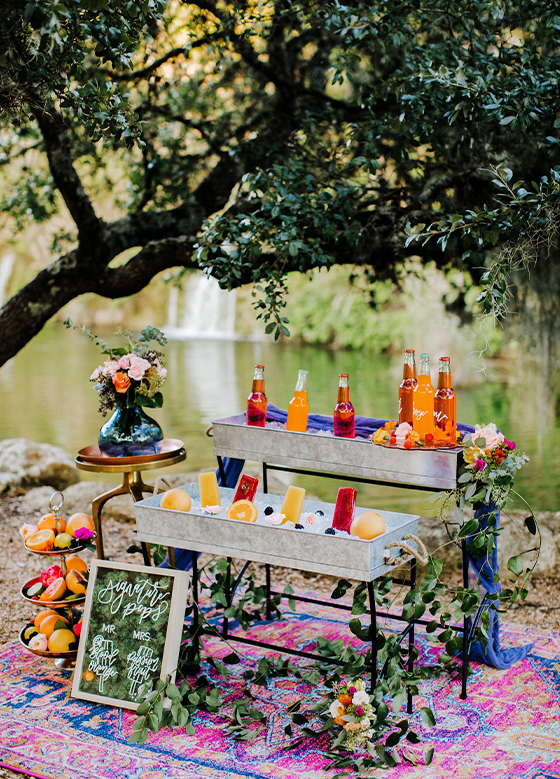 Colorful popsicles and soda at wedding reception