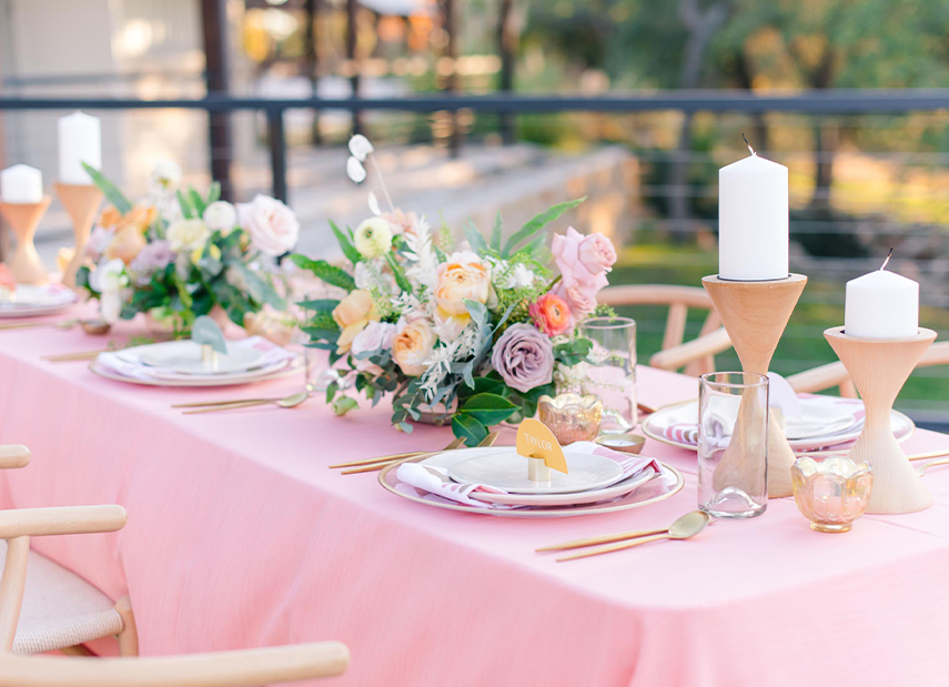 pink table settings outside