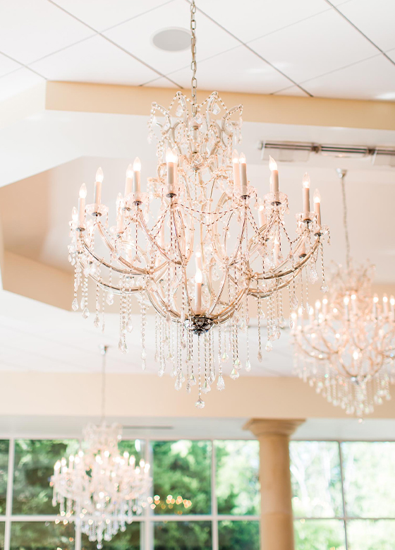 Close up of gorgeous ballroom chandeliers