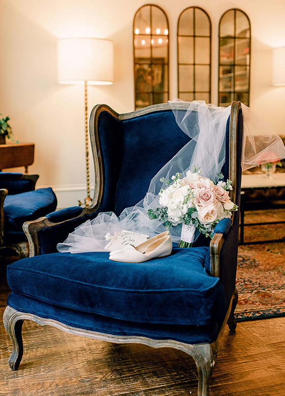 blue chair with veil and flowers