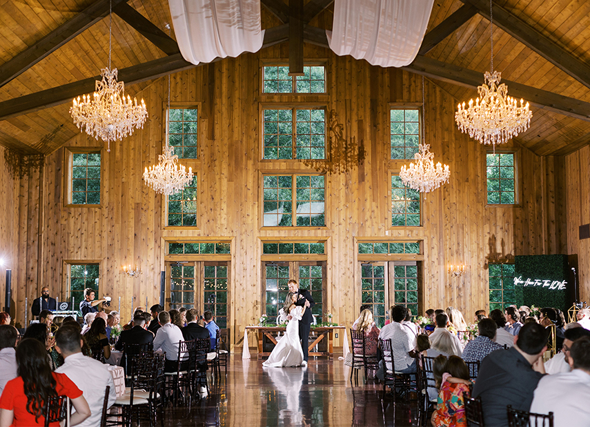 Bride Groom First Dance The Carriage House Rustic Wood Barn Reception Large Greenery Windows